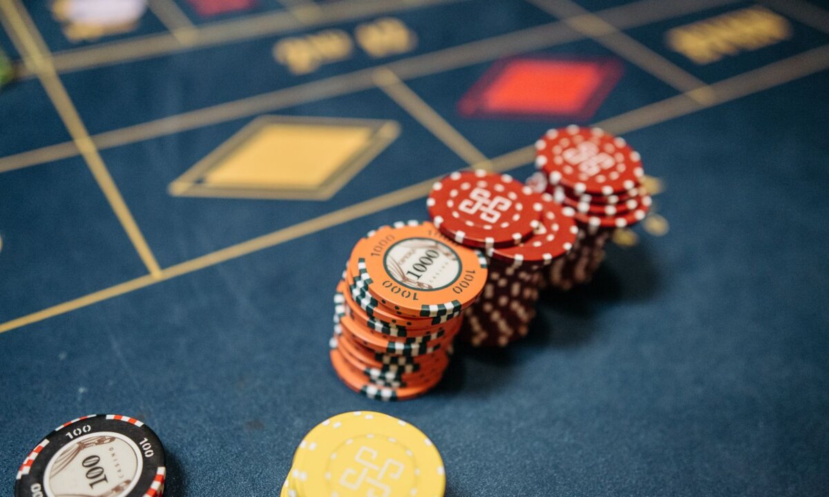 Different casino chip stacks for NZ$1 NZ$5 NZ$10 and NZ$20 deposit options